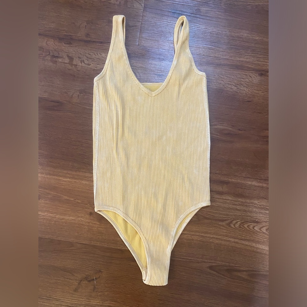 Tan body suit